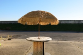 Tiki table in the parking lot / drining area